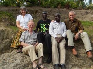 Peter Silverwood (R) and the South Rwenzori Junior team